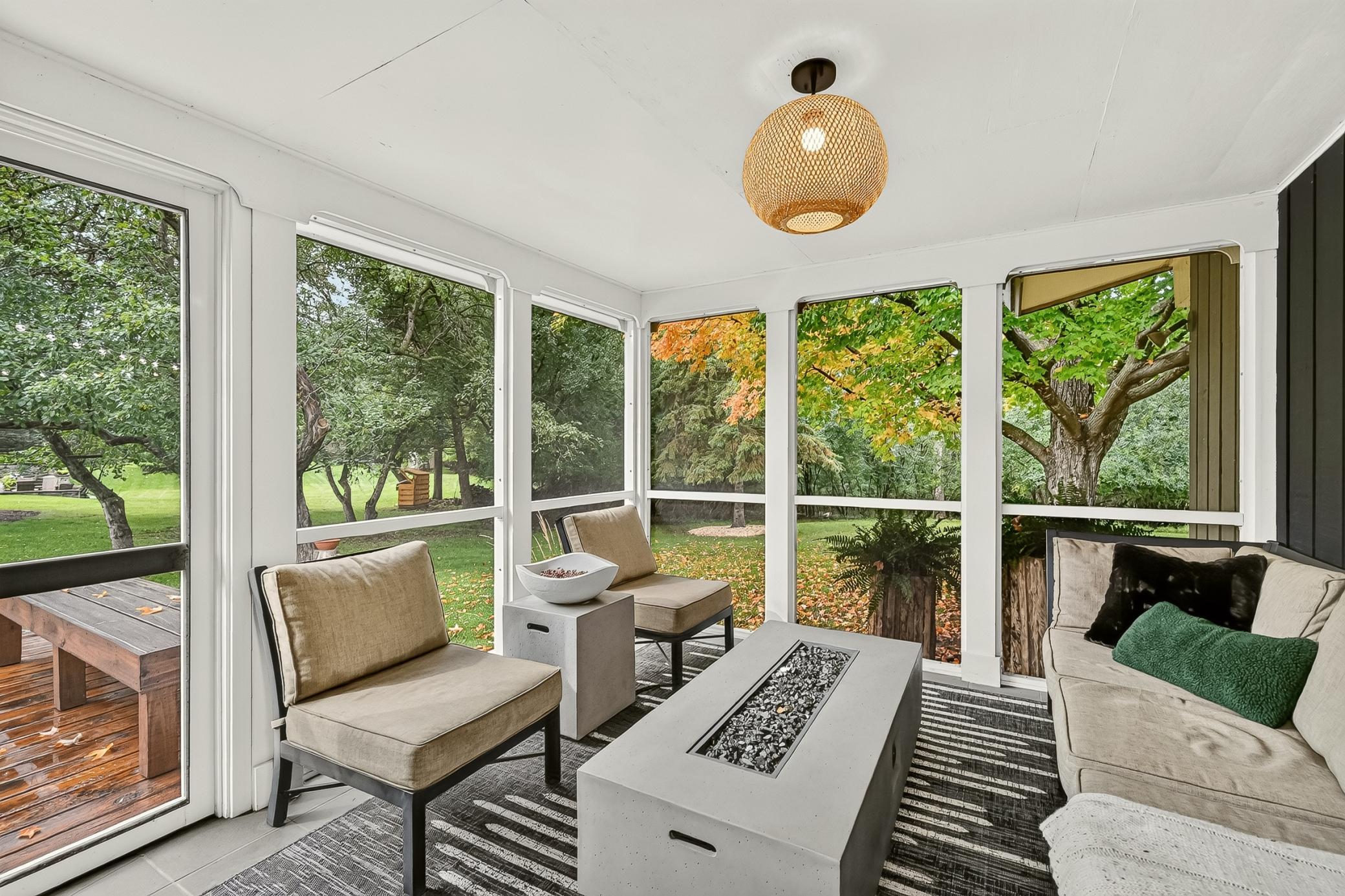 Newly screened in porch lets you take in your serene surroundings.