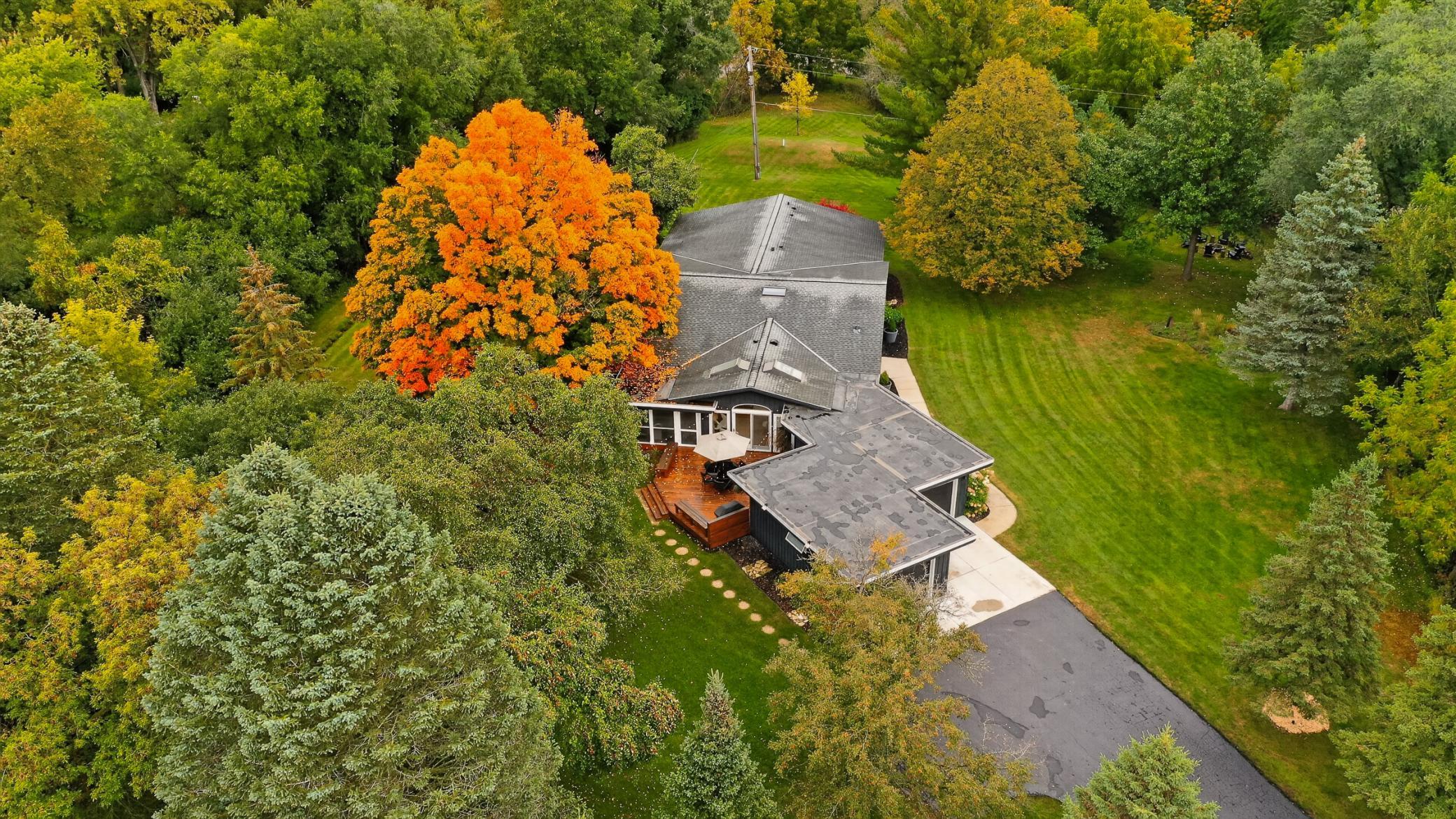 Perfectly positioned on one of Merrihills’ most beautiful lots, offering exceptional privacy and a truly picturesque setting.