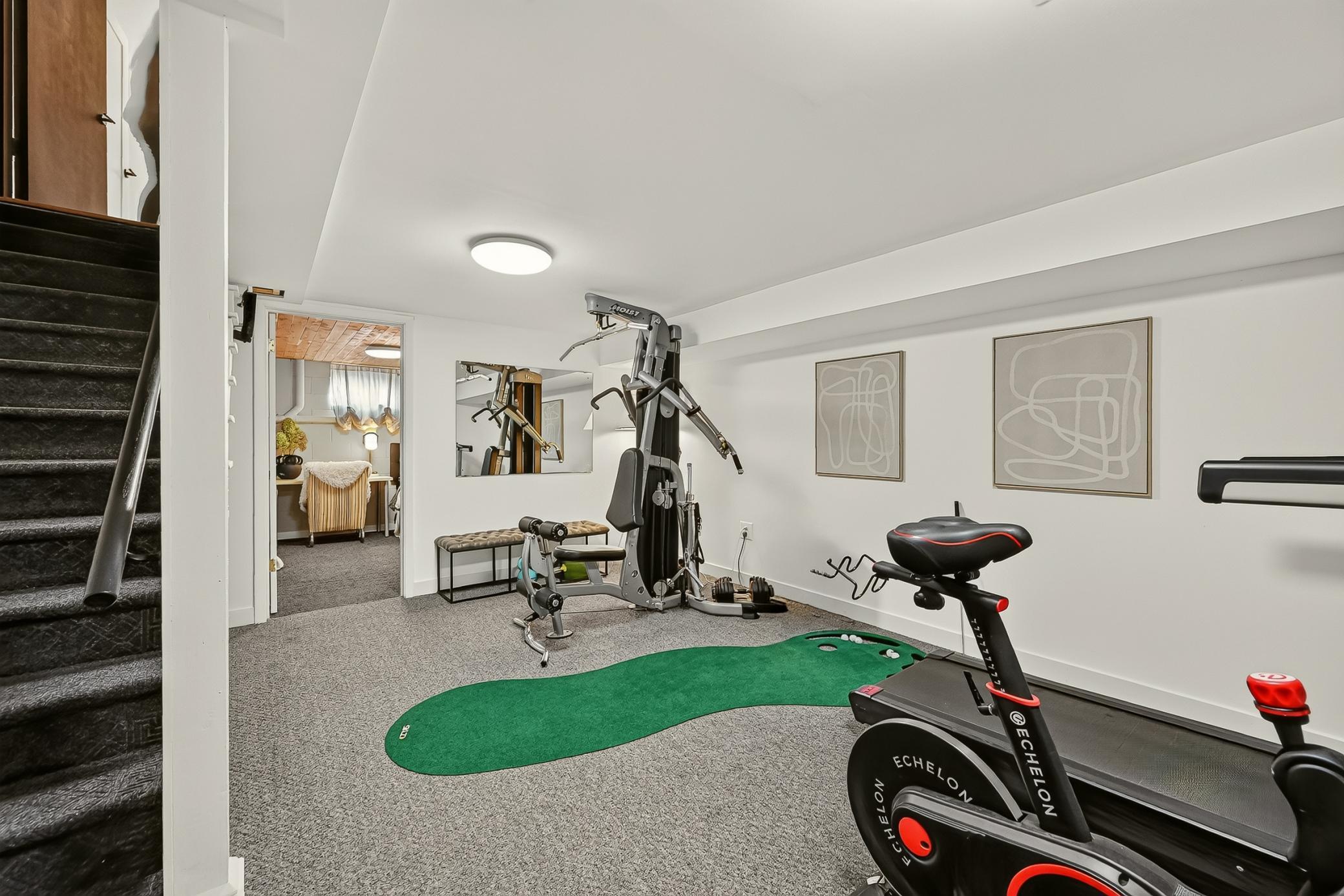 Versatile finished lower-level space is ready to fit your lifestyle—ideal for a home gym, hobbies, theater, gaming or whatever you envision.