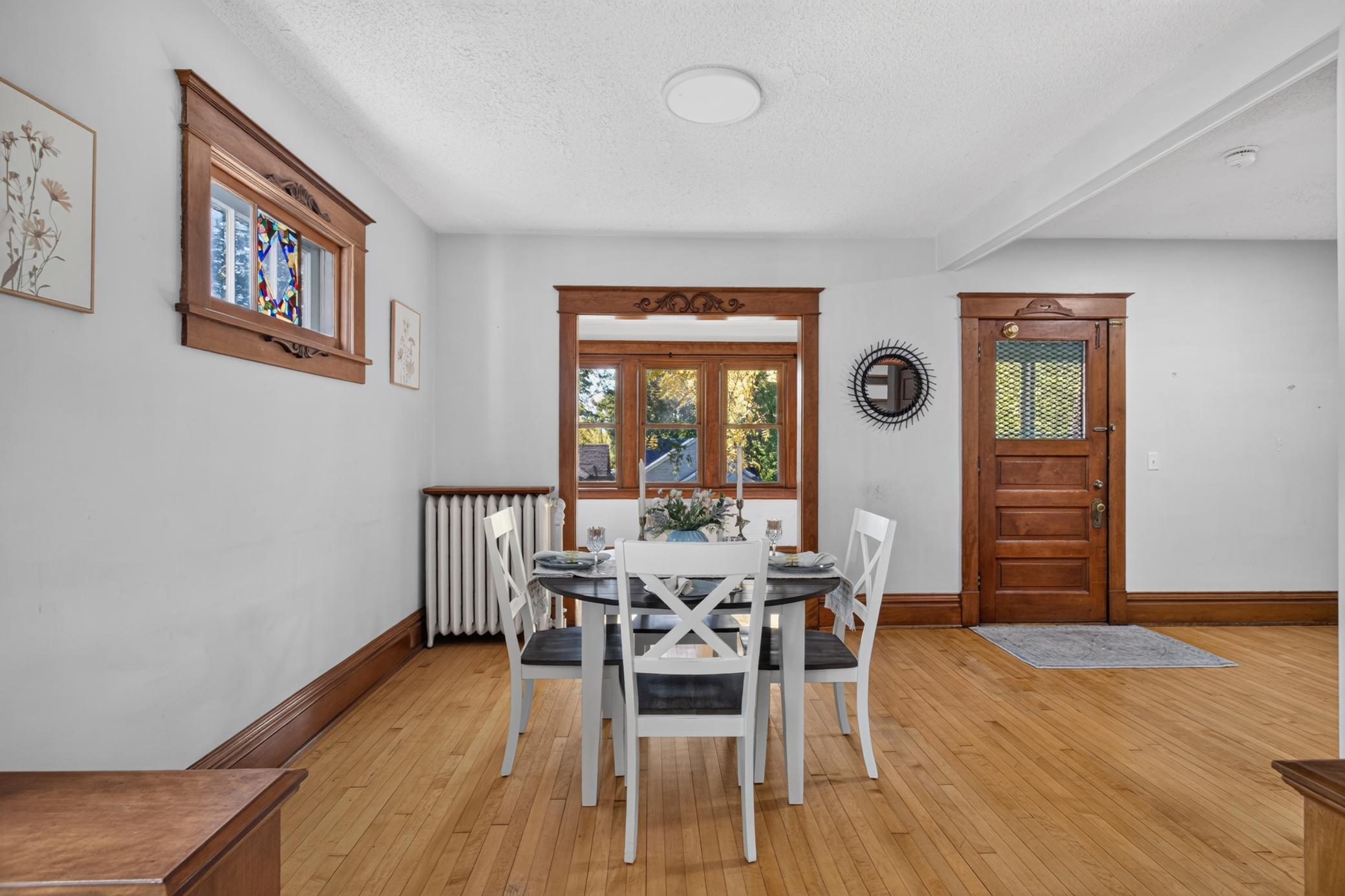 Dining room to sunroom and entry
