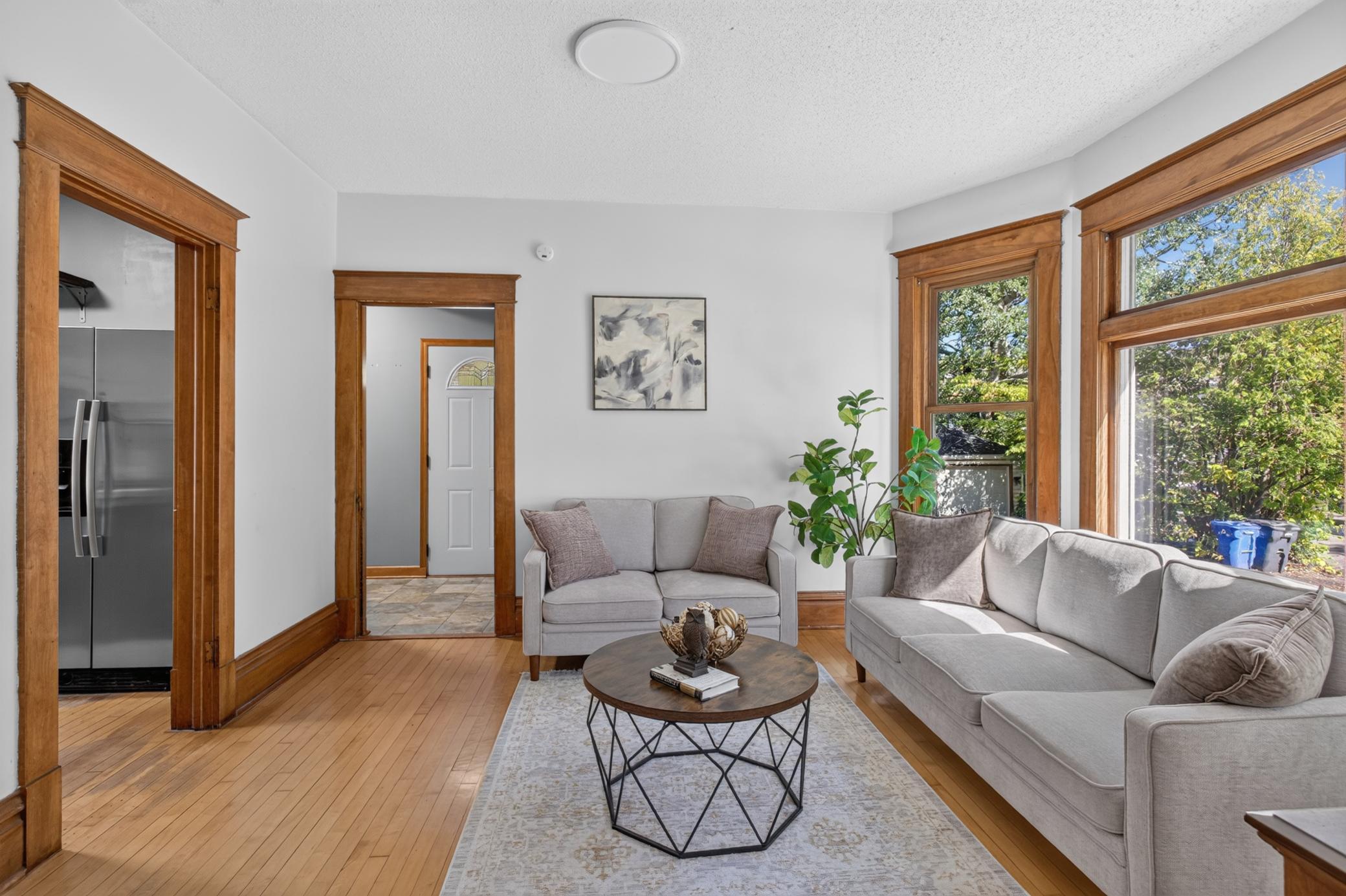 Living room to kitchen and back entry