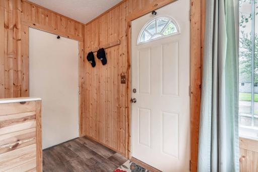 Door to Patio/Driveway and Doore to Garage
