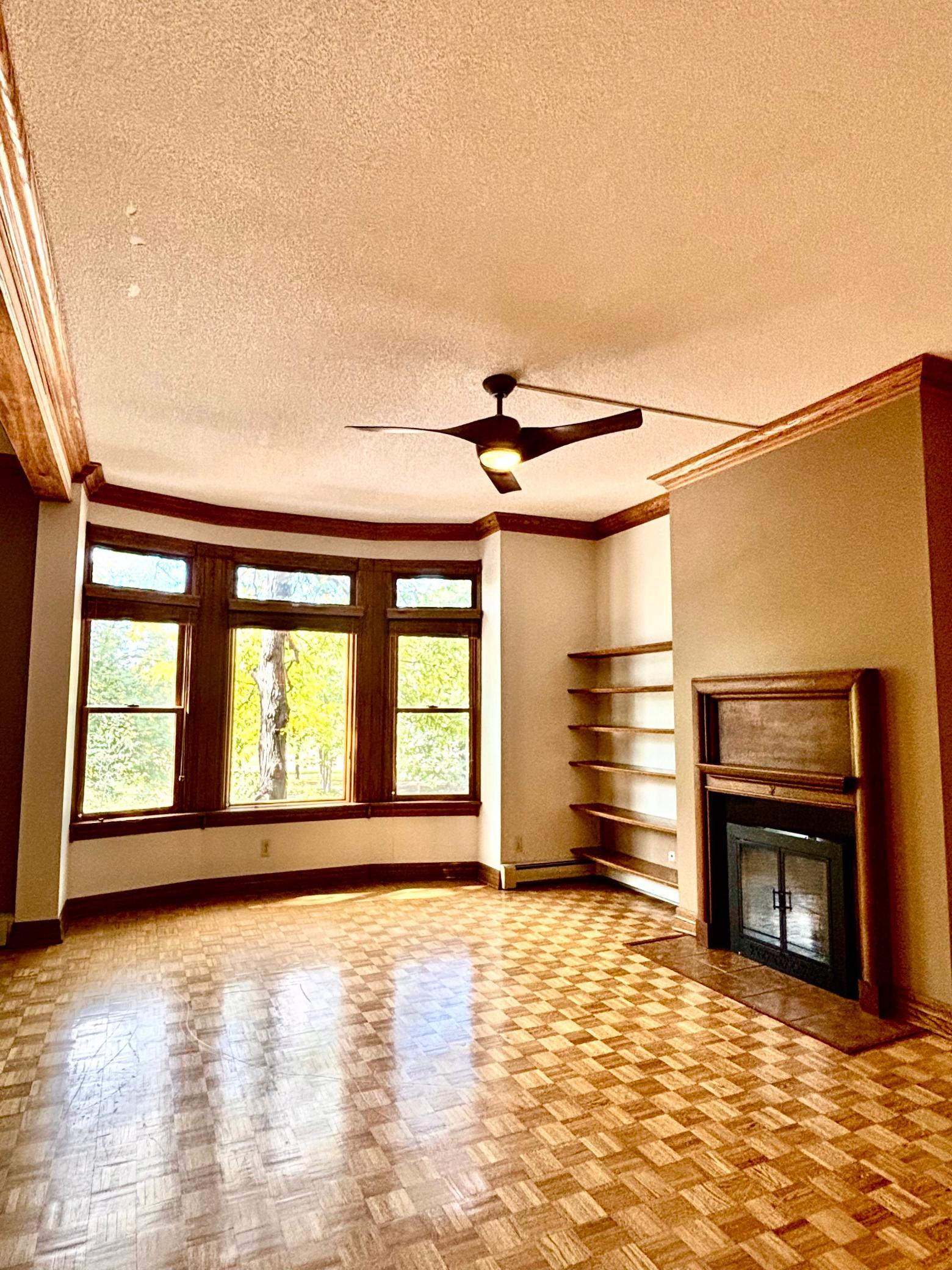 Living room with wood burning fireplace