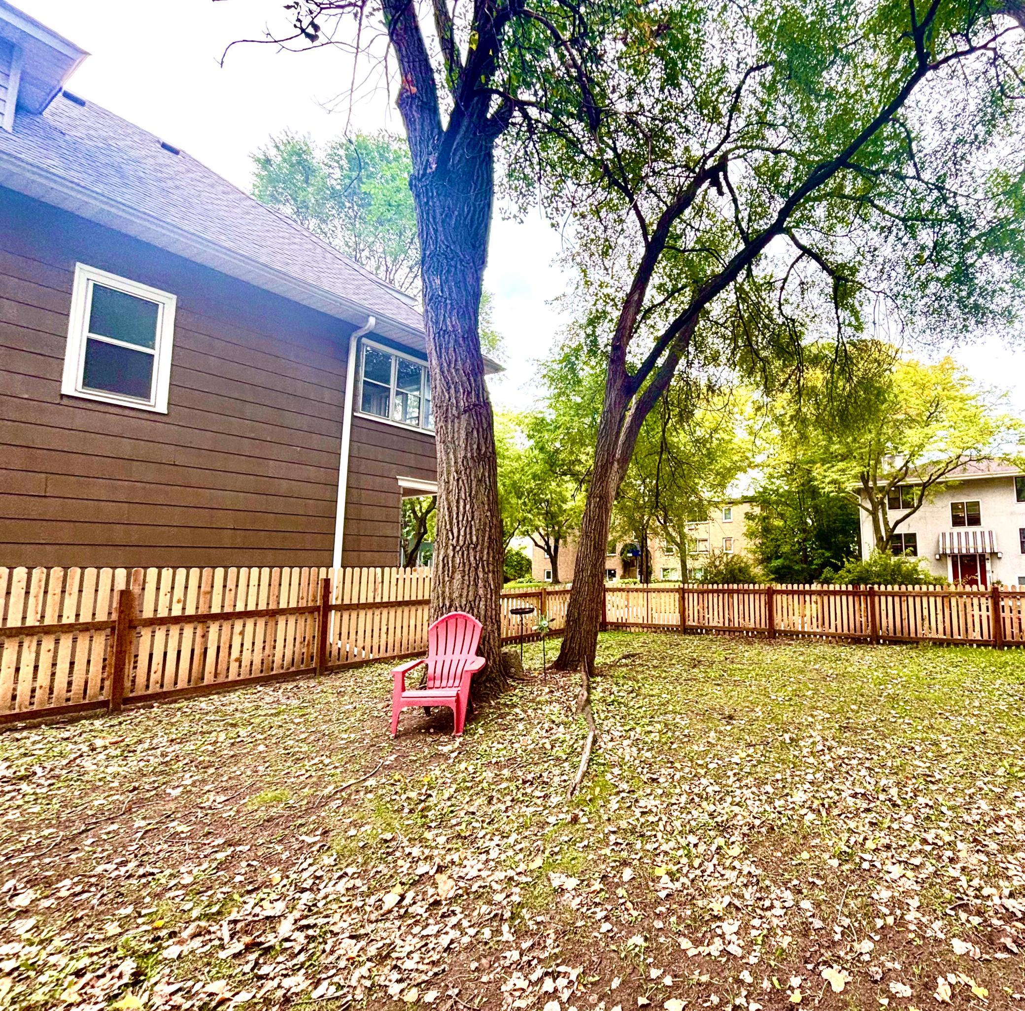 Large yard by parking across alley for each unit to use