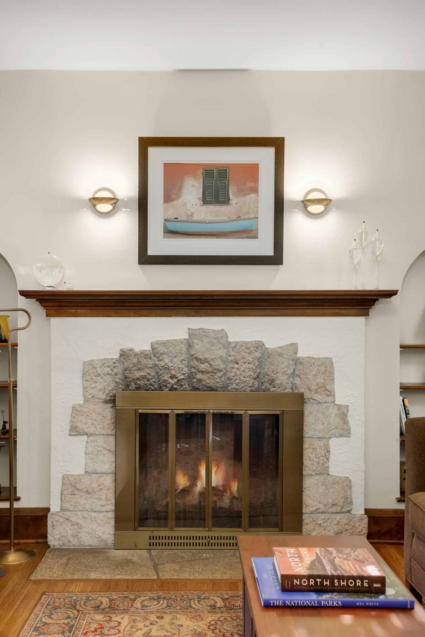 The centerpiece of the living room is this stunning fireplace