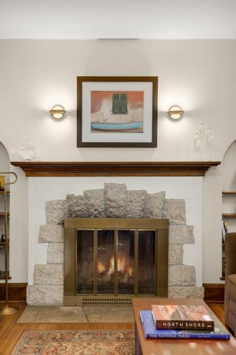 The centerpiece of the living room is this stunning fireplace