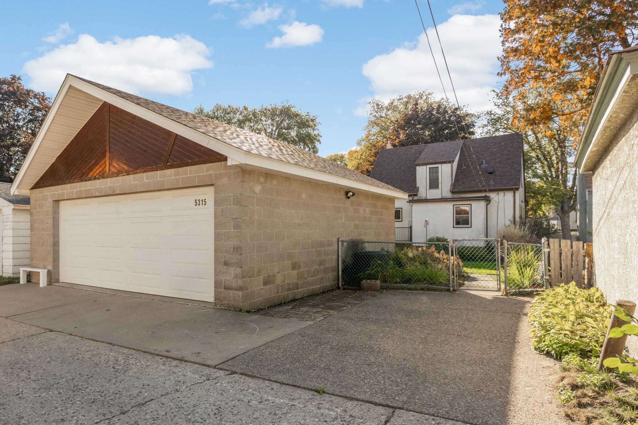 The spacious, oversized 2-car garage is another highlight of this wonderful home and the door is oversized at 18ft wide for parking even large vehicles.
