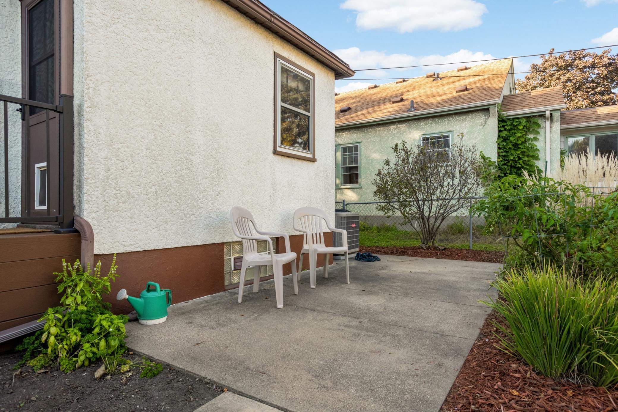 Enjoy relaxing on the patio in the fenced backyard