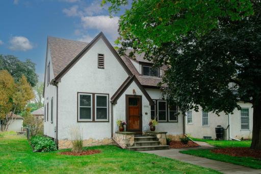 This gorgeous 3-bedroom home in the Nokomis East neighborhood is full of charming details including a beautiful stucco exterior