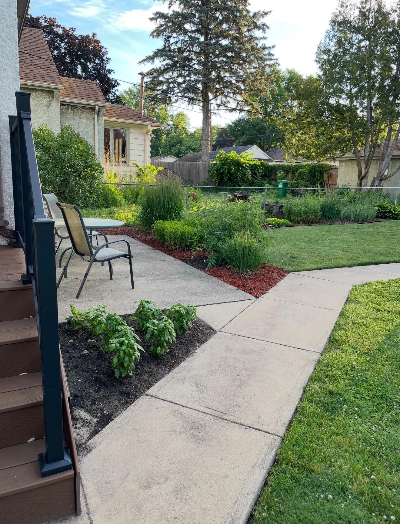 Enjoy relaxing on the patio in the fenced backyard