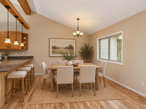 The large dining room is just off of the kitchen - virtually staged