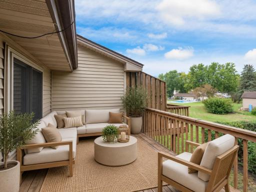Plenty of room to sit and enjoy the spacious deck - virtually staged