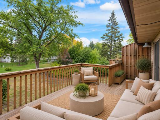 What a view of the greenspace from your deck - virtually staged