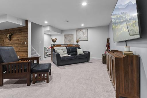 Downstairs, you'll find a full basement featuring newer carpet installed in 2022.