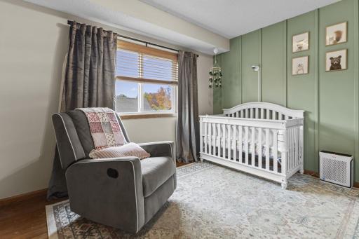 The third and final upstairs bedroom features a board and batten accent wall.