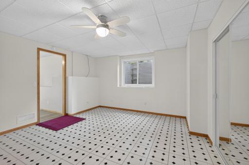 Another view of bedroom # 5 with 2 wide glider egress window for more natural light.