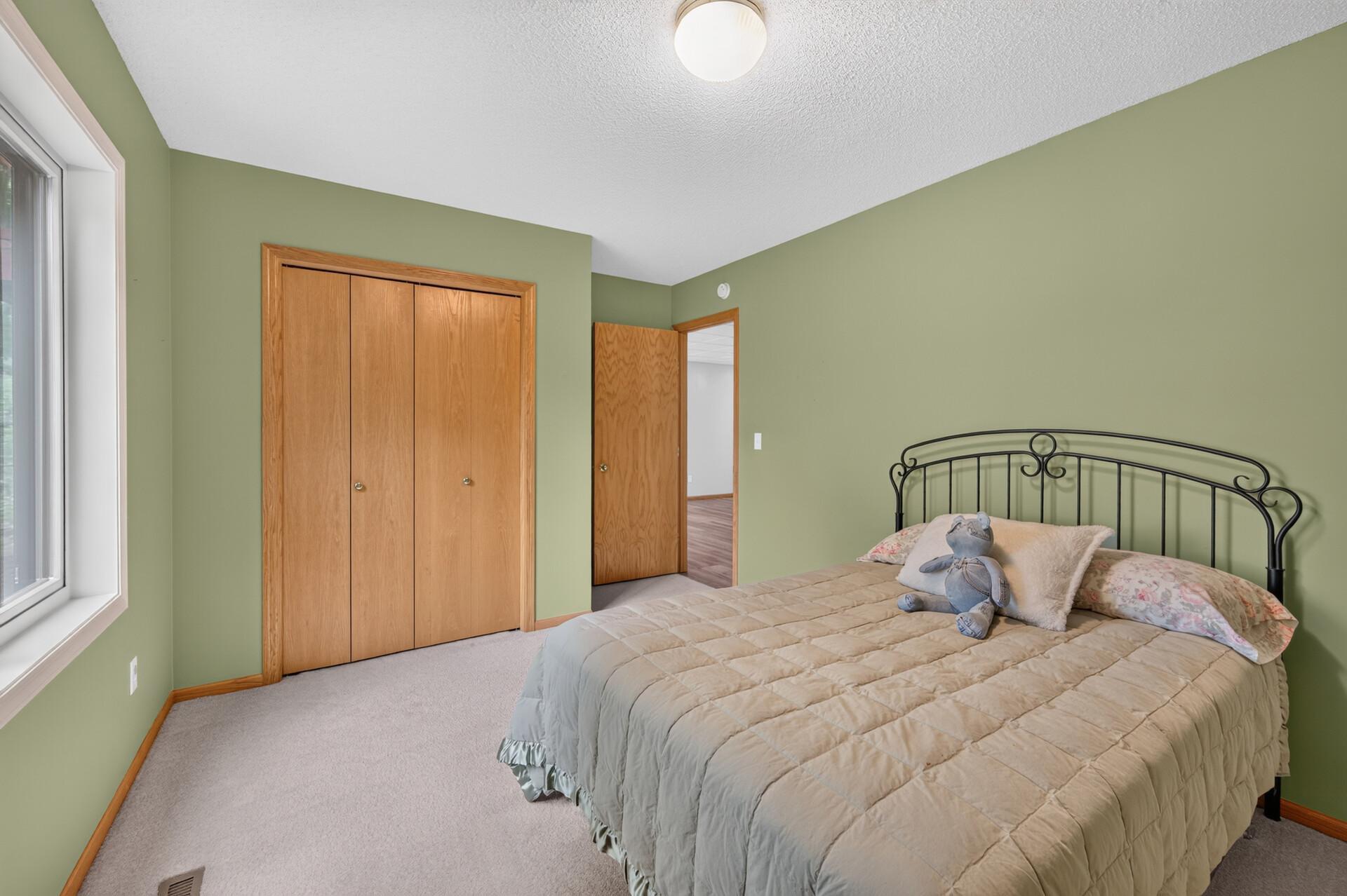 Another view of Bedroom # 3 in the basement and its closet.