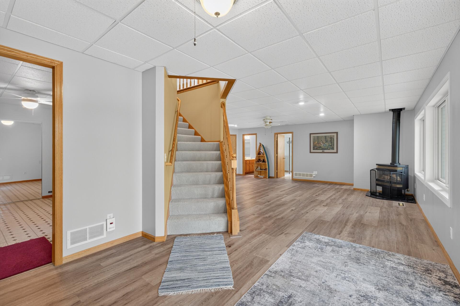 A view of the stairways coming down to the family room in the walkout basement.
