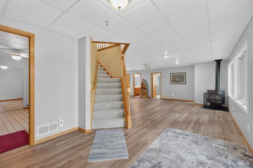 A view of the stairways coming down to the family room in the walkout basement.