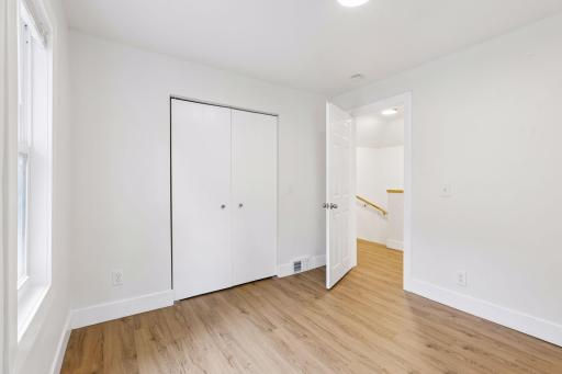 Unit 1: A double closet rounds out this second upper level bedroom.