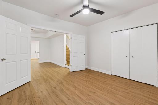 Unit 1: A second view showcases the French doors and the spacious feel of this main-floor bedroom.