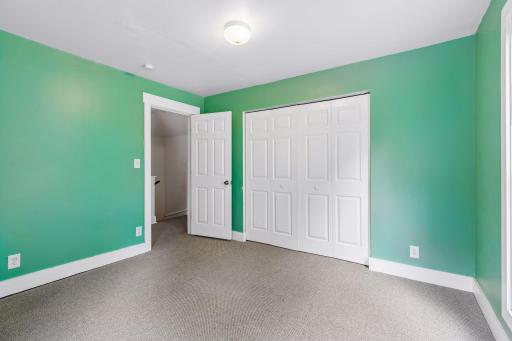 Unit 2: A double closet adds ample storage for this second bedroom.