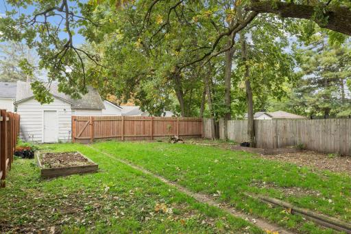 Full, private fenced in yard with access to the garage.