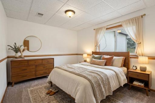 Lower level: bedroom 3 (virtually staged)