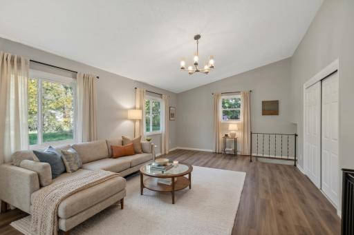 Main level: 2nd bonus living room off the back of the house (virtually staged)
