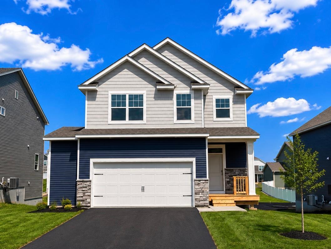 Welcome to The Louisville, a 4 bedroom, 3 bathroom home in The Fields of Waconia. *Photo is virtually staged. Landscaping and trees will vary. Sod is not laid yet, but is included.