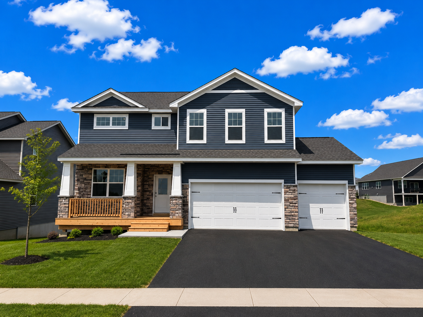 921 Foxglove Terrace offers beautiful curb appeal with a Northern Craftsman elevation! This home has a 3-car garage. *Photo is virtually staged. Landscaping and trees will vary. Sod is not laid yet, but is included.
