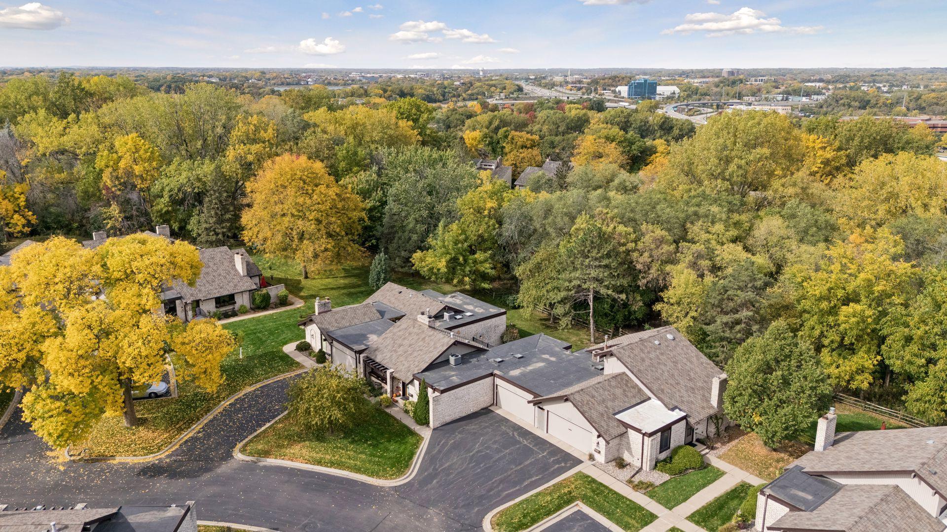 Wraparound deck and covered patio provide inviting spaces to enjoy the setting.