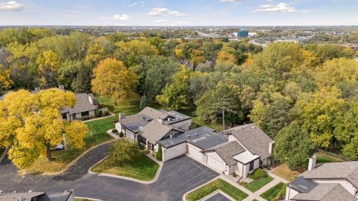 Wraparound deck and covered patio provide inviting spaces to enjoy the setting.