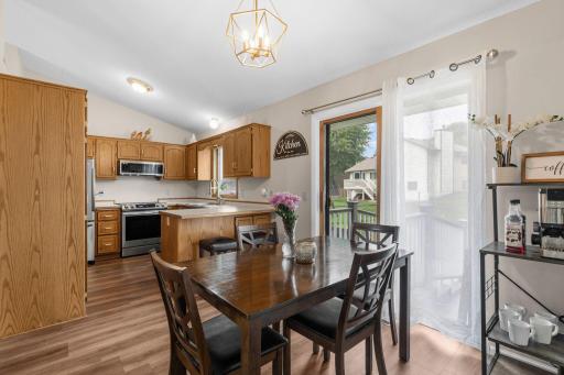 Convenient informal dining area with a walk-out to deck & patio