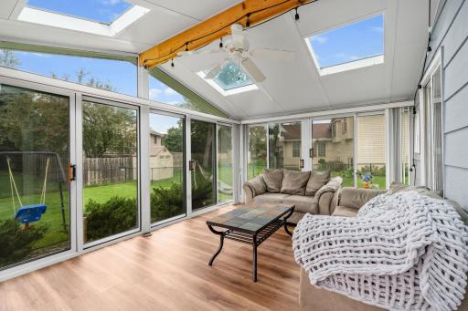 Imagine playing a board game, your morning coffee or just enjoying listening to the birds out in this wonderful sunroom, complete with all sliding glass doors & skylights