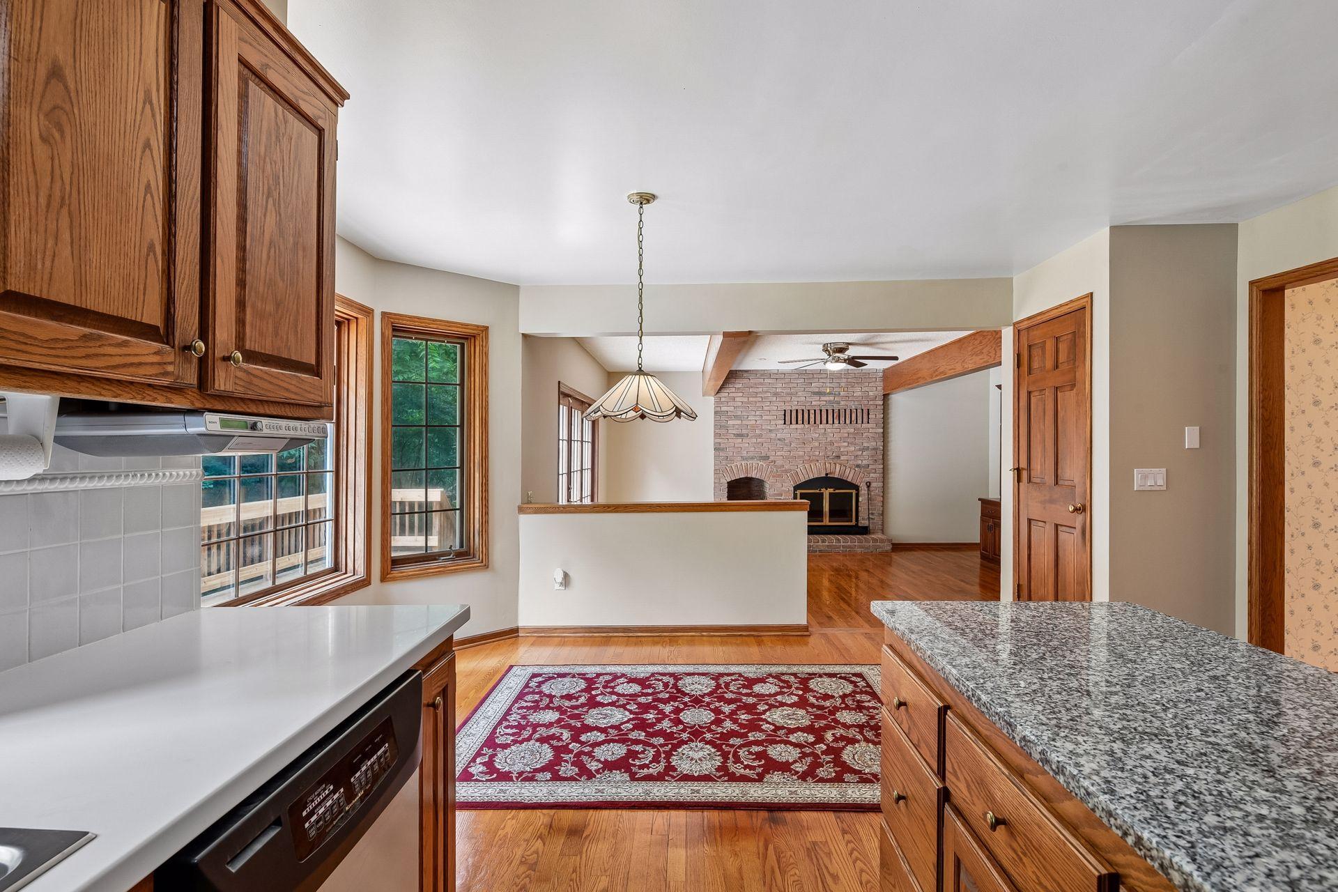 Kitchen area leading into the family room