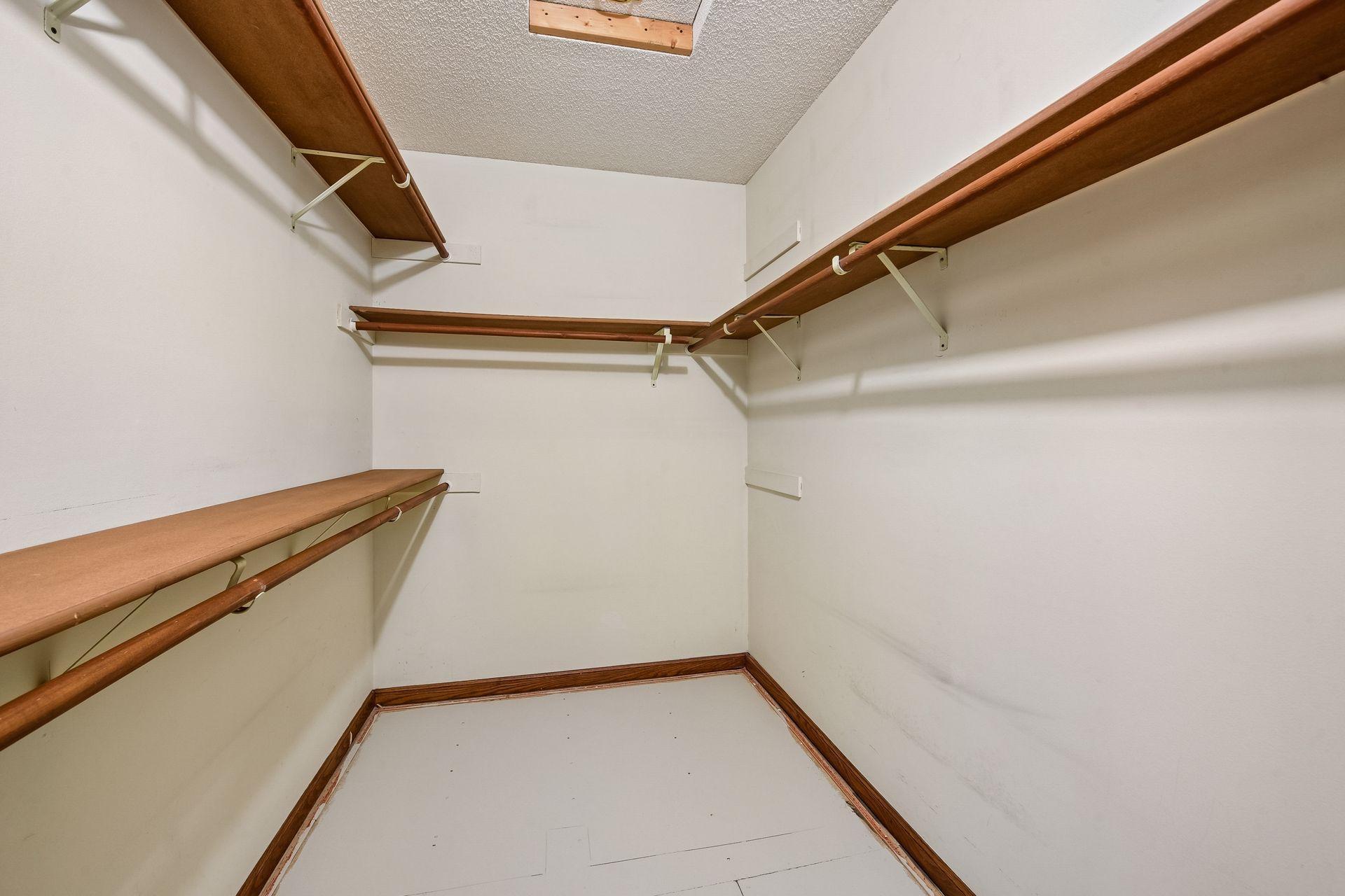 Spacious walk-in closet in the primary bedroom