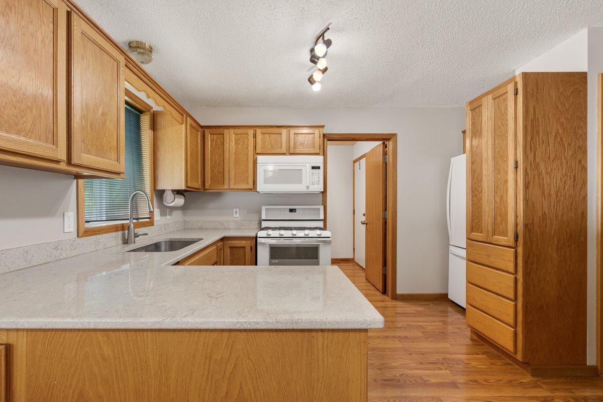 Kitchen area updated counter tops - laundry room off of kitchen and 1/2 bath