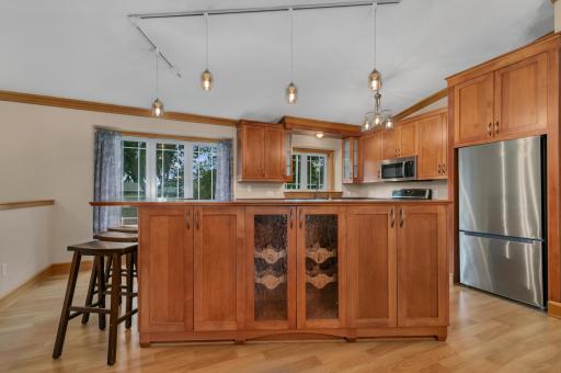 Inside, the heart of the home is the custom-remodeled kitchen, designed with both style and function in mind.