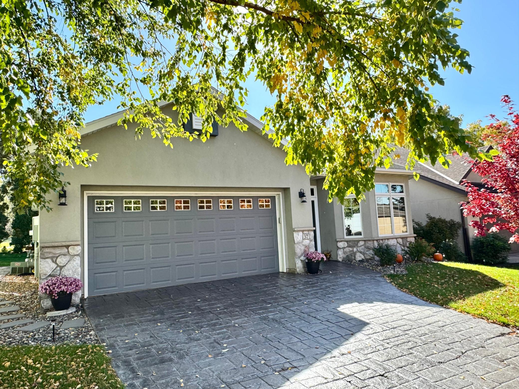 Custom Stamped Driveway Adds And Element That Is Warm And Welcoming!