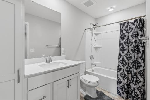 Upper level full bath with additional storage