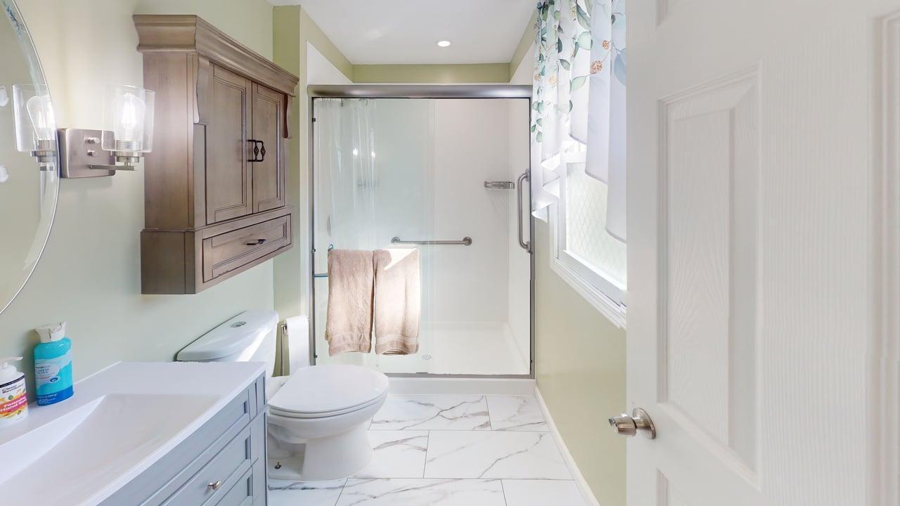 3/4 private bathroom w/walk-in shower