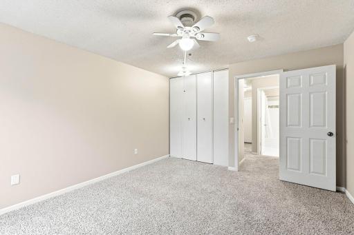 Generously sized bedroom features ample closet space, neutral finishes and easy access to the full bath.