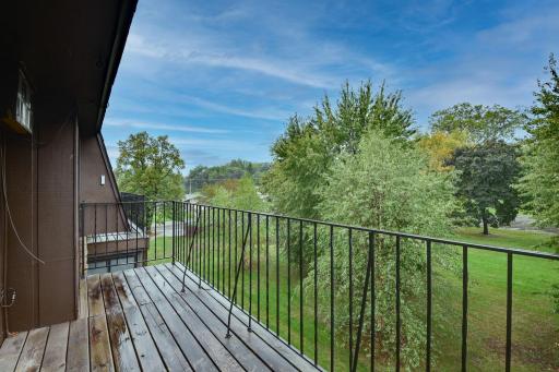 Private balcony offers a relaxing outdoor extension of the living space with leafy views over the community grounds