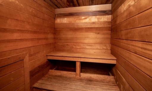 Enjoy the convenience of an on-site community sauna, one of several shared amenities available to residents.