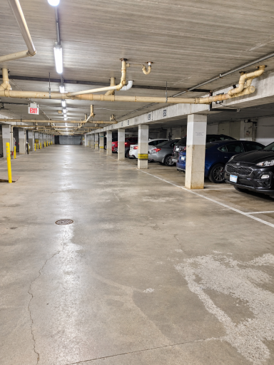 Underground heated parking with a dedicated space for washing cars