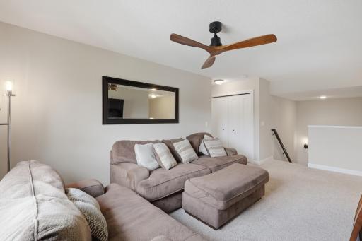 Versatile loft that's perfect for a family room, home office, or play area