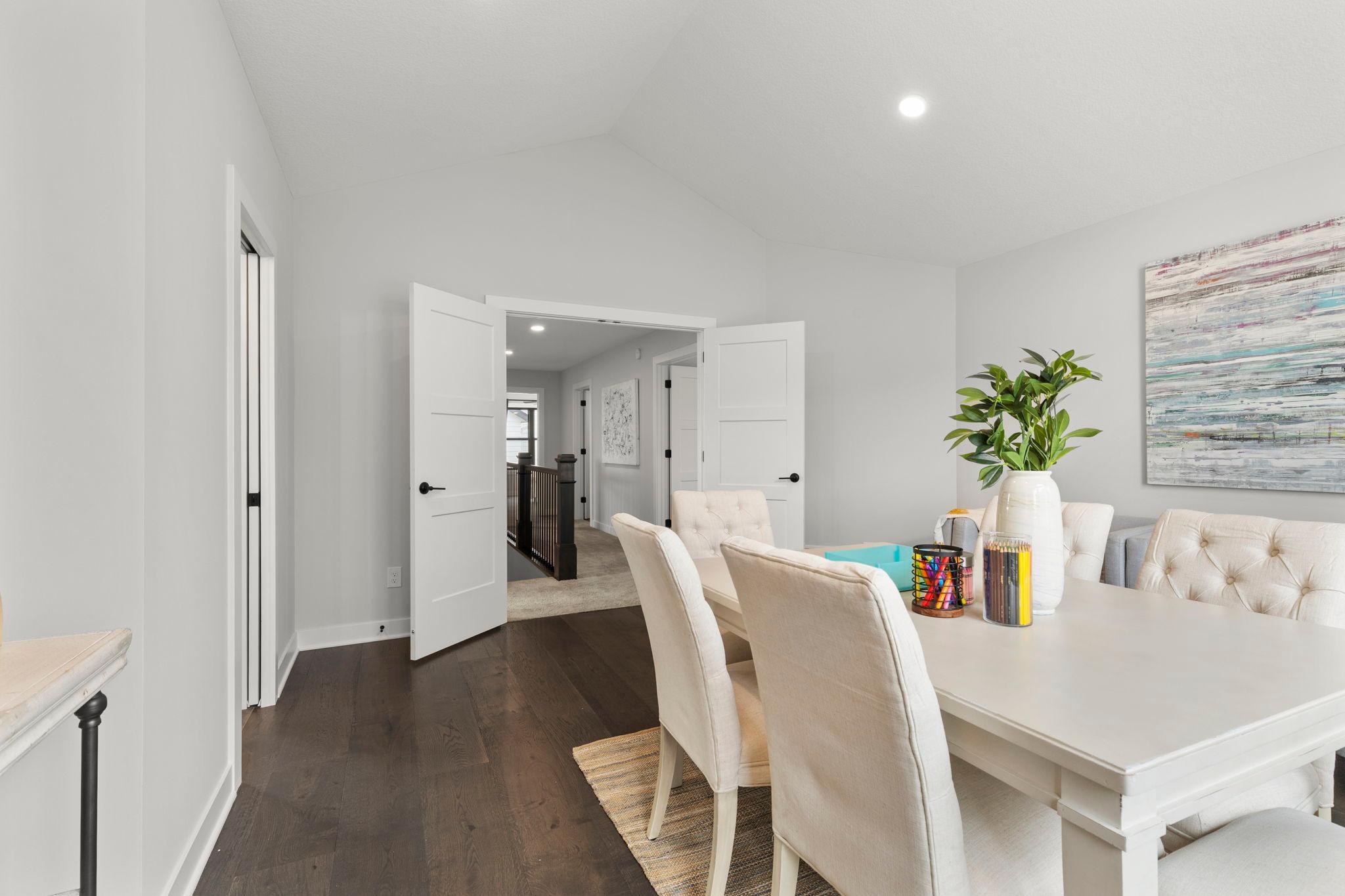 This versatile space offers endless possibilities as a secondary sitting area, recreation room, home office, studio, or whatever best suits your needs.