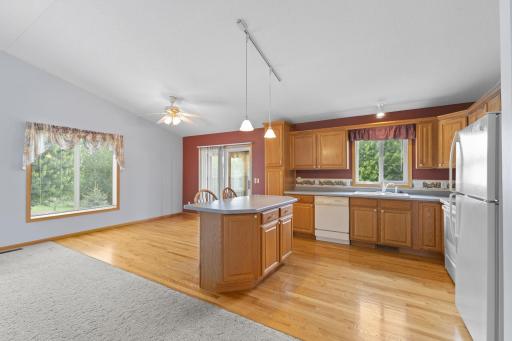 The seamless flow between the living room, dining area, and kitchen makes this home ideal for everyday living and entertaining alike.