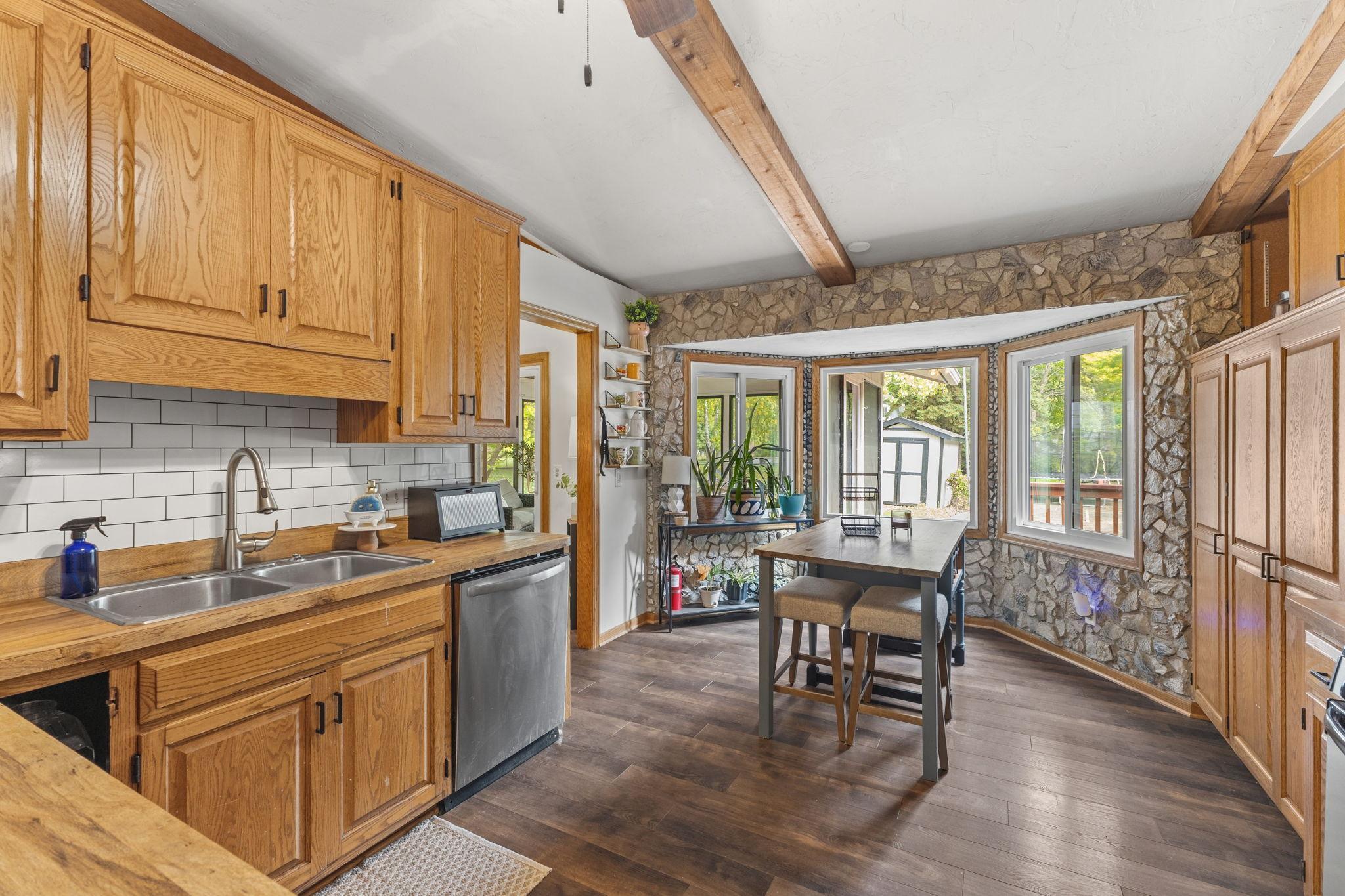 Custom Kitchen with Bay Window Dining
